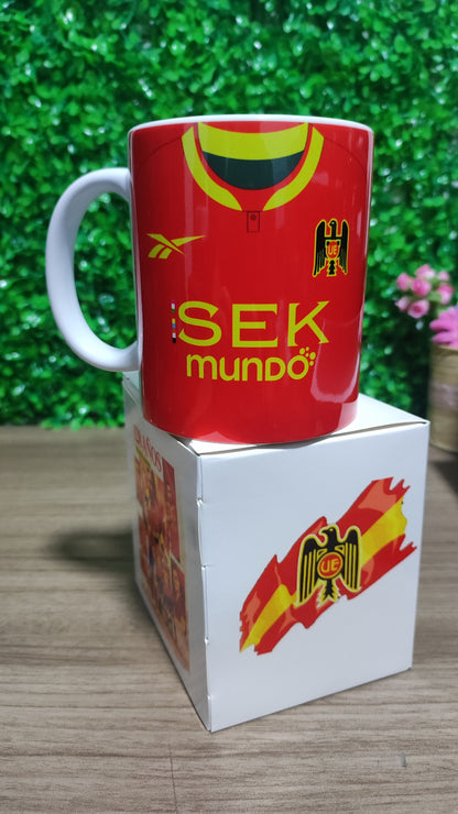 Taza U española 2025 + Caja Temática · Diseño 120
